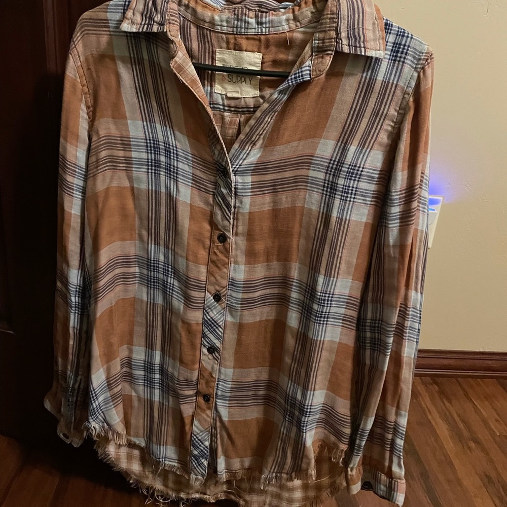 Women’s button top size XS.